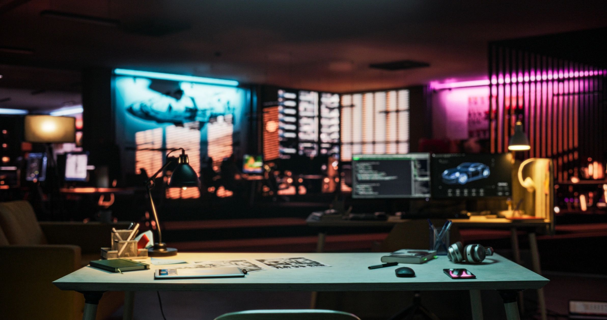 Creative workspace with modern tools and neon-lit production environment